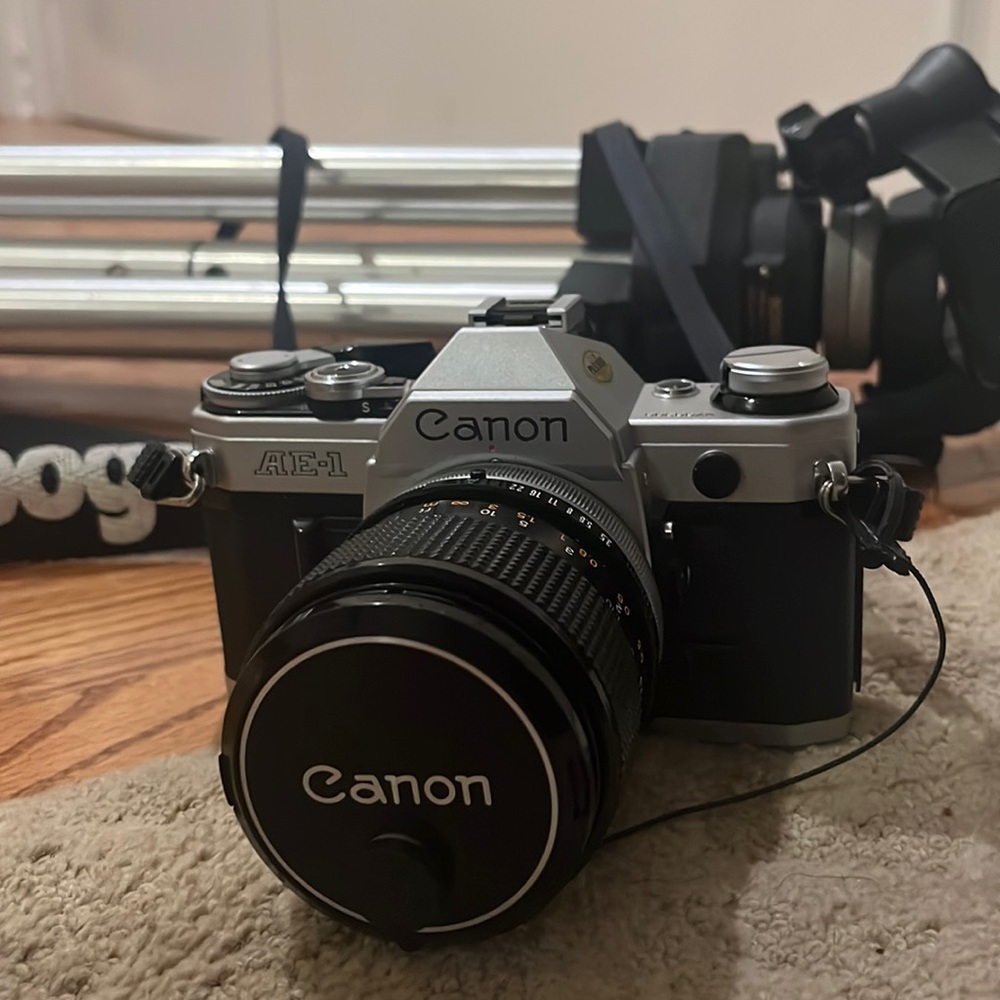 Canon camera, two 50mm lenses and tripod all included. it’s been well stored